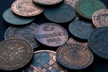 Background from old money of Imperial Russia. 19 - 20 century.Vintage multi-colored Russian coins...