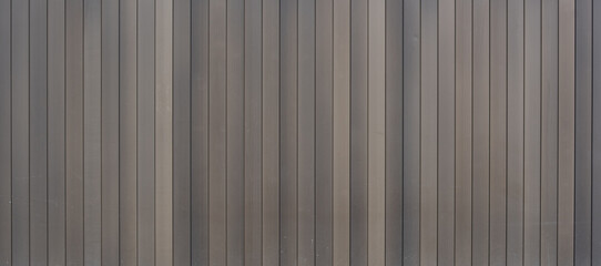 Texture of an anodized brown aluminum facade