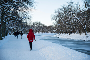 Fototapeta na wymiar person walking in the snow