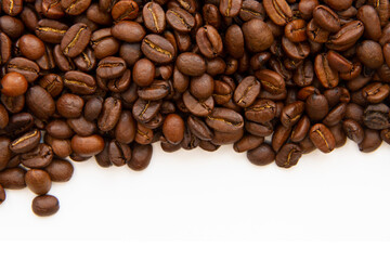 Coffee beans isolated on white background with copyspace for text. Coffee background or texture concept.