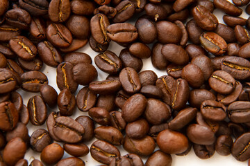 Coffee beans isolated on white background with copyspace for text. Coffee background or texture concept.