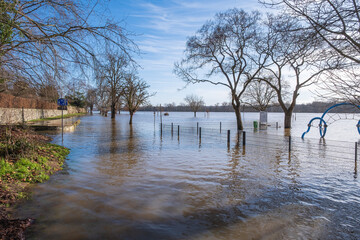 View along the flooded waterfront in Eltville / Germany on the Rhine on a sunny day 