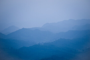 Fototapeta na wymiar Top view of mountainscape. A view of blue mountains.
