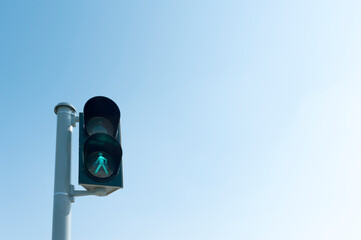 green burnt traffic light, crosswalk