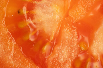 a close-up of sliced tomato