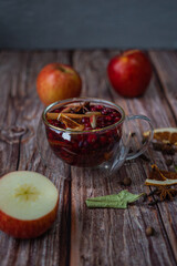 berry juice with orange slices in a glass cup