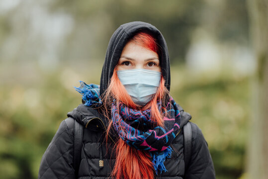 Single Mom Wearing A Face Mask Outdoor In Covid-19 Pandemic Times