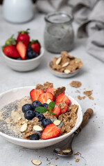 Bowl of fresh homemade oatmeal porridge with  berries. Healthy food for Breakfast.