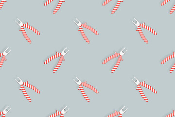 Fototapeta na wymiar Pliers seamless pattern. Metal pliers with rubber striped grips. Background made of tools. 