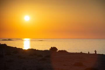 The tropical, scenic nudist beach of agios Ioannis on Gavdos island, Greece at sunset.