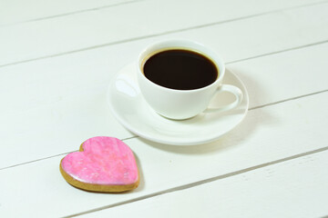 cup of coffee and gingerbread in the form of hearts. Breakfast on Valentine's Day or 8 March.