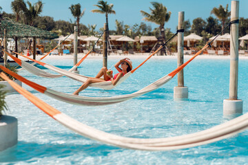 Happy lifestyle girl on hammock