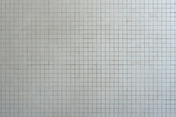 Checkered dirty white brick stone