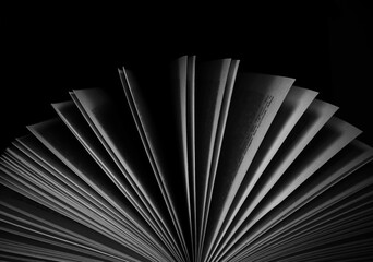 Abstract photo of book pages in the dark