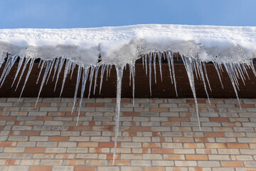 icicles hanging from a roof