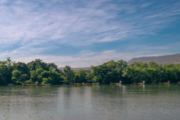 Set of boats in a tropical river.