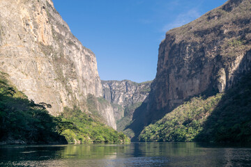 Landscape of mountains on a river. Sumidero Canyon in Chiapas, Mexico.