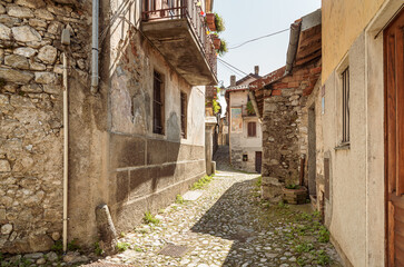 Fototapeta na wymiar Ancient street at painters village Arcumeggia in province of Varese, Italy.