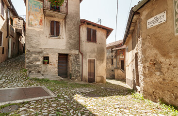 Fototapeta na wymiar Ancient street at painters village Arcumeggia in province of Varese, Italy.