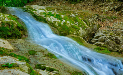 mountain river rushing through canyon
