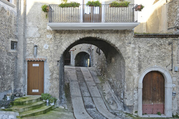 A small street between the old houses of  Montesano sulla marcellana, an village in the province of Salerno.