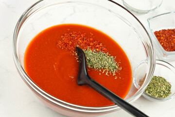 Preparing pizza variations with salami and spinach - series picture 06