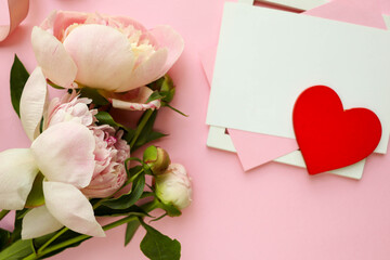 Happy Valentine's Day greeting card. flowers and red heart on a white background. space for text 
