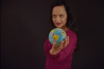 woman holding globe