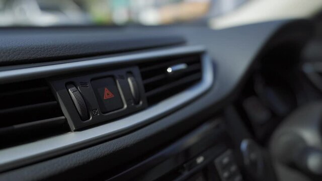 hand push hazard lights button , emergency light's button, 4k soft focus
