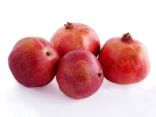 juicy,red pomegranate and glass of juice