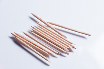 Set of cosmetic tools for manicure and pedicure on a white background. Manicure sticks top view.