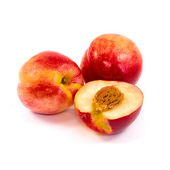 Fototapeta na wymiar Sweet peaches fruit half isolated on white background.
