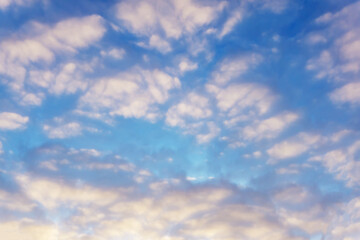 blurred purple clouds in a blue sky