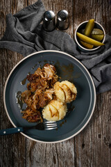 Fried liver with onion.