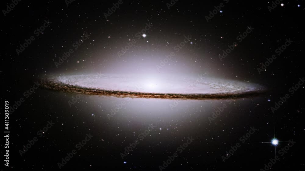 Wall mural spectacular view of sombrero galaxy rotating in space animation. based on image furnished by nasa