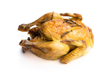 Raw whole corn fed poussin in clear glass bowl isolated on white background