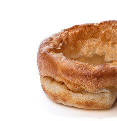 Fresh baked Yorkshire pudding isolated on white background