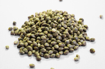 hemp seeds  macro image on white background