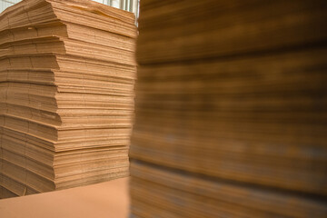 Bales of stacked cardboard sheets