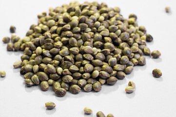 hemp seeds  macro image on white background