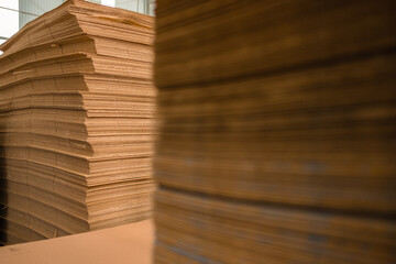 Bales of stacked cardboard sheets