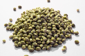 hemp seeds  macro image on white background