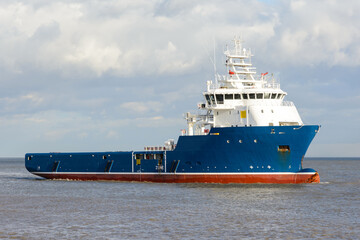 Oil industry platform supply ship at sea