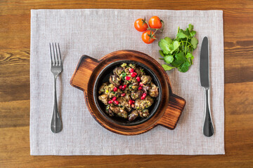 Baked chicken liver hearts in the cast iron stove.
