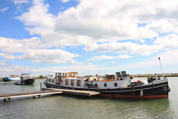 Fototapeta na wymiar River boat in Villeneuve les Maguelone, a seaside resort in the south of Montpellier, Herault, France