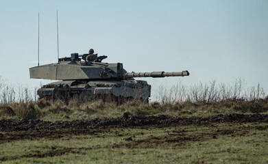 Fototapeta premium British army Challenger 2 ii FV4034 Main Battle Tank in action on a military exercise, Wiltshire UK