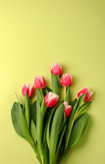 Fototapeta premium Spring concept, bouquet of tulip flowers on a light background. Women's day, Valentine's day concept, Mother's Day. Vertical position. Flat lay. Copy space.