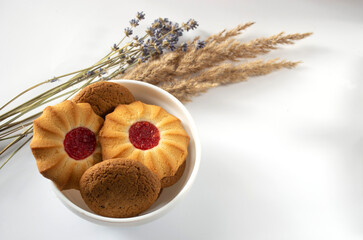 Cookies in a bowl on a light background.