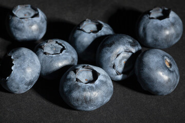 blueberry group on black background