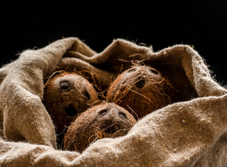 
Coconuts, naturally burlap and fresh from the tree